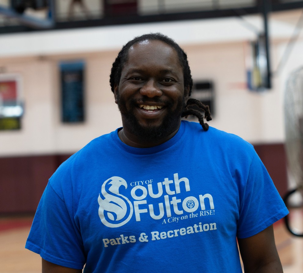 man-smiling-wearing-south-fulton-shirt